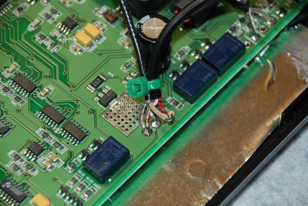 Securing the cables with a tie.