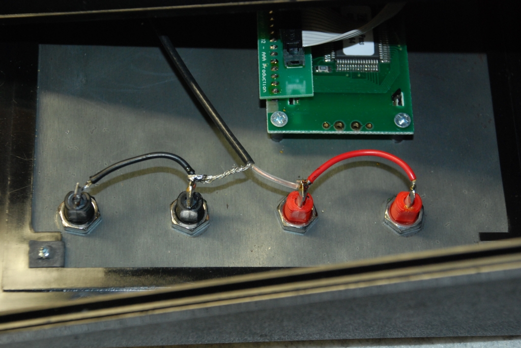Connecting the other end of the shielded cable to electrode jacks.